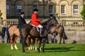 Young children sat on horses in an English countryside setting, waiting for the fox hunt to begin Royalty Free Stock Photo