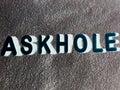askhole latest communication terminology displayed on abstract background