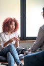 Woman asking about antidepressants while speaking with psychologist