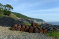 Old rusty barrels on Askold Island in Peter the Great Bay. Primorsky Krai Royalty Free Stock Photo