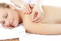 Asleep woman receiving an acupuncture treatment Royalty Free Stock Photo