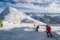 Skiers on the slope. Cableway and hill Chopok in Low Tatras mountains, Slovakia.