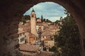 Ancient arches of a small town near Treviso, with towers and historical brick houses around