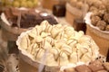 Asorted chocolate truffles and pralines. Chocolate and coconut candies on the counter in the confectionery store