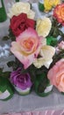 Asorted Roses bouqet on the table colors variety vivid vibrant