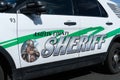 Asotin County Sheriff name and logo on side of police car