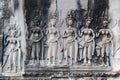 Aspara dancers, dancing girls on bas-relief, scarved in stones of Angkor Wat, Siem Reap, Cambodia, Asia. Scarving