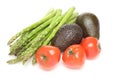 Asparagus,avocados and tomatoes in a white background