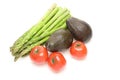 Asparagus,avocados and tomatoes in a white background