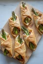 Asparagus baked in puff pastry with ham and cheese Royalty Free Stock Photo