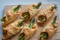 Asparagus baked in puff pastry with ham and cheese Royalty Free Stock Photo