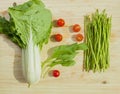 Asparagus, cherry tomatoes, bunches of bok choy