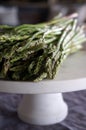 Asparagus close up on marble pedestal