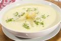 Asparagus cream soup in a white bowl Royalty Free Stock Photo