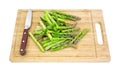 Asparagus on cutting board with knife Royalty Free Stock Photo