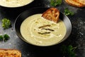 Asparagus and mint cream soup with sour dough toast bread Royalty Free Stock Photo