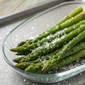Asparagus with Salt on Glass Dish Royalty Free Stock Photo