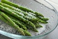 Asparagus with Salt on Glass Dish Royalty Free Stock Photo