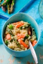 Asparagus and Shrimp Risotto in blue dish Royalty Free Stock Photo