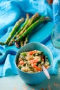 Asparagus and Shrimp Risotto in blue dish Royalty Free Stock Photo