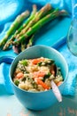 Asparagus and Shrimp Risotto in blue dish Royalty Free Stock Photo