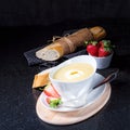 Asparagus soup with poached egg and fresh baguettes