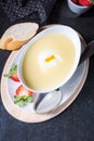 Asparagus soup with poached egg and fresh baguettes