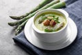 Asparagus soup in white bowl Royalty Free Stock Photo