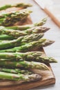 Asparagus on a wooden cutting board Royalty Free Stock Photo
