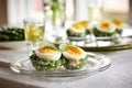 asparagus wrapped with organic quail egg salad in glass bowls