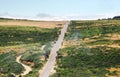 Asphalt car road and clouds on blue sky in summer day Royalty Free Stock Photo