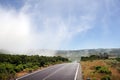 Asphalt car road and clouds on blue sky in summer day Royalty Free Stock Photo