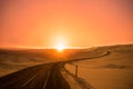 Asphalt country road at sunset.inspirational concept travel on empty road.scene of dramatic sky over asphalt road