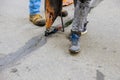 Asphalt crack filler asphalt crack repair, liquid, joint sealant joint seal concrete Royalty Free Stock Photo