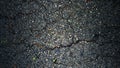 Asphalt cracks road black background