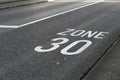 Asphalt Driveway with 30km/h Speed Limit `Zone 30` in Switzerland Royalty Free Stock Photo