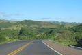 asphalt highway amidst nature