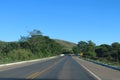 asphalt highway amidst nature