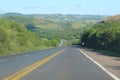 asphalt highway amidst nature