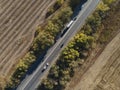 Asphalt highway or motorway road in countryside with car and truck traffic Cargo Semi Trailer Moving. Aerial Top View Royalty Free Stock Photo