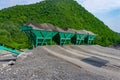 Asphalt hot mix plant. asphalt plant cold aggregate feed system. container with sand and aggregate - stone dust in the correct pro Royalty Free Stock Photo