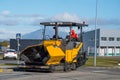 Asphalt laying machin driving on the road