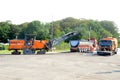 Asphalt milling machine at work in a road crossing