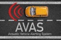 Asphalt with miniature car and AVAS Acoustic Vehicle Alerting System