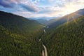 Asphalt mountain road through the mountains and hills with green pine forest Beautiful natural landscape with mountain Royalty Free Stock Photo