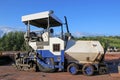 Asphalt paver on a construction site