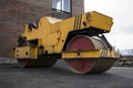 Asphalt paving machine . Asphalt road roller with heavy vibration roller compactor Royalty Free Stock Photo