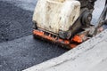 Asphalt rammer. laying the road surface