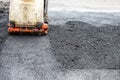 Asphalt rammer. laying the road surface