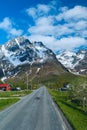 Asphalt road across norwegian village